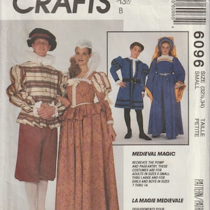 Puede incluir: Un patrón de costura para trajes medievales. El patrón incluye instrucciones para hacer una camisa a rayas rojas y blancas, un vestido marrón con ribete de encaje blanco, una túnica a rayas azules y blancas y un vestido azul con ribete dorado. El patrón es para tallas X-Small a Large para adultos y tallas 7 a 14 para niños. El patrón se titula "Medieval Magic" y "La Magie Medievale".