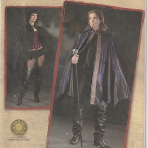 May include: Simplicity sewing pattern number 2529 for a black and purple cape with a gold trim. The pattern includes instructions for making a cape for a man and a woman.