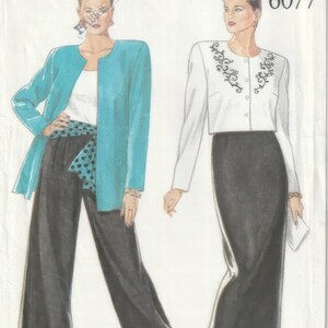 May include: A sewing pattern for a two-piece outfit, featuring a long skirt and a jacket. The jacket has a decorative design on the front. The pattern is for large sizes and is labeled "New Look 6077".