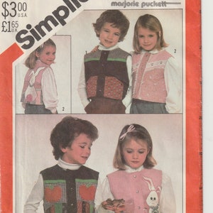 May include: Simplicity sewing pattern 5634 for children's vests. The pattern includes appliqués and features various vest designs with different fabric patterns and a bunny design. The price is $3.00 U.S.A.