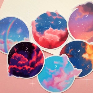 May include: Set of six round stickers featuring colourful illustrations of night skies with clouds, stars, and crescent moons. The stickers are perfect for adding a touch of whimsy to laptops, water bottles, journals, and more.