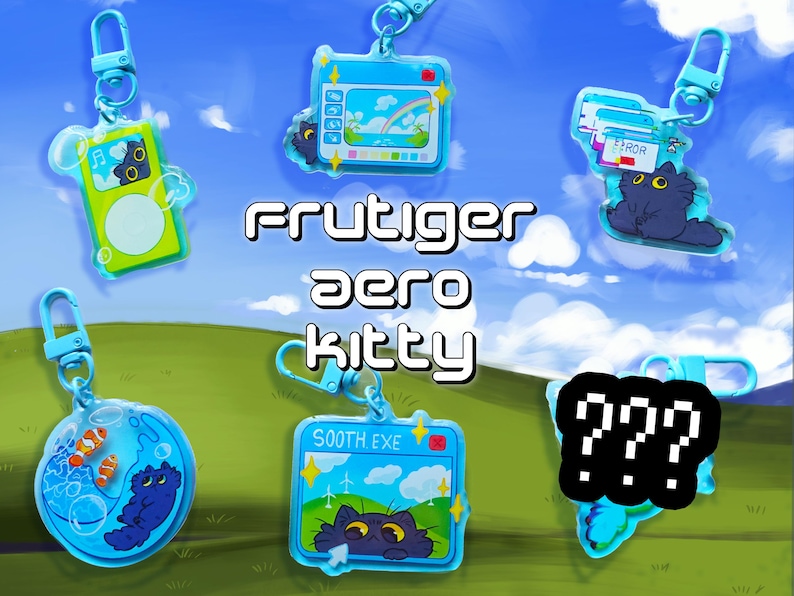 May include: A collection of Frutiger Aero Kitty keychains in various designs. Each keychain features a cartoon cat character in a different setting, such as a landscape, an MP3 player, or a computer screen. The keychains are blue and have a silver clasp.
