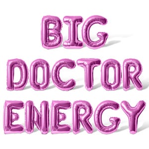 May include: Pink foil balloons spelling out the phrase "BIG DOCTOR ENERGY".