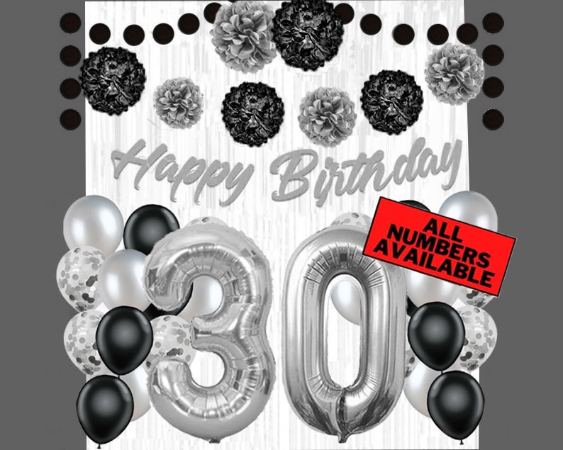 May include: Black and silver birthday decorations with silver number balloons that spell out "30". The background is a white woodgrain pattern with black polka dots. The text "Happy Birthday" is written in silver script. A red banner reads "All Numbers Available".