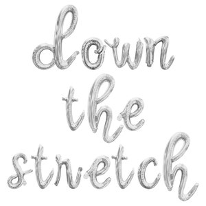 May include: Silver foil balloons spelling out the phrase "Down the stretch" in a cursive font.