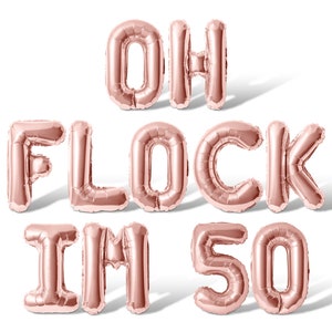 May include: Rose gold foil balloons spelling out "Oh Flock I'm 50".