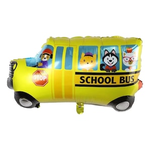 May include: A yellow school bus shaped foil balloon with a stop sign and the words "SCHOOL BUS" printed on the side. There are four cartoon animals in the windows of the bus.