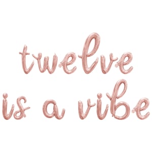 May include: Rose gold foil balloons spelling out "twelve is a vibe".