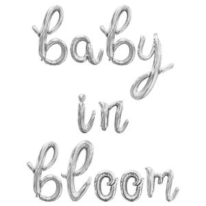 May include: Silver foil balloons spelling out the phrase "Baby in Bloom".