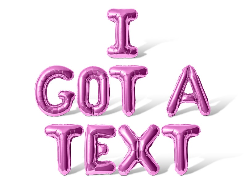 May include: Pink foil balloons spelling out the phrase "I GOT A TEXT".