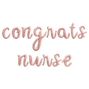 May include: Rose gold foil balloons spelling out "congrats nurse".