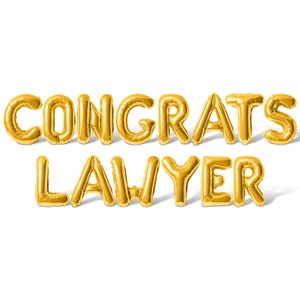 May include: Gold foil balloon letters spelling out "CONGRATS LAWYER" on a white background. The balloons are inflated and casting shadows, creating a celebratory and festive atmosphere. Perfect for a graduation.