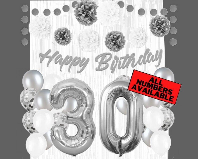 May include: Silver and white birthday decorations with the words "Happy Birthday" and the numbers "30". The decorations include balloons, tissue paper pom-poms, and a banner. The text "All Numbers Available" is also included.