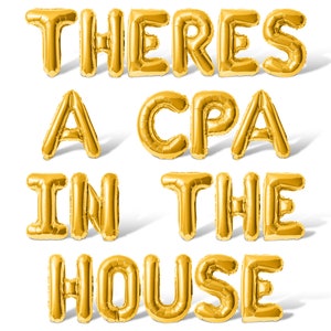 May include: Gold foil balloons spelling out the phrase "Theres a CPA in the house".