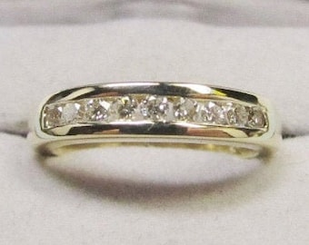 Inner Smile 14 Karat Gold and 9 Diamond Band (E)