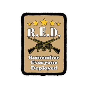 May include: A rectangular patch with a tan background and a thick black border. It features five yellow stars above the white text R.E.D. Two crossed rifles are centered below the text, followed by the white text Remember Everyone Deployed.
