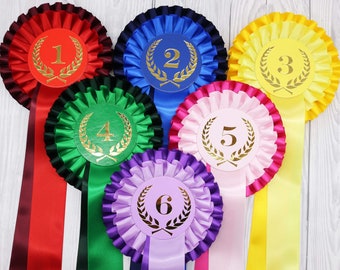 2-tier rosettes, 68mm centres with Laurel place motif, 2 wide tails, includes tail print option, all events