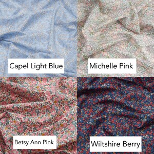 May include: Four fabric swatches with floral patterns. The swatches are labeled "Capel Light Blue", "Michelle Pink", "Betsy Ann Pink", and "Wiltshire Berry".