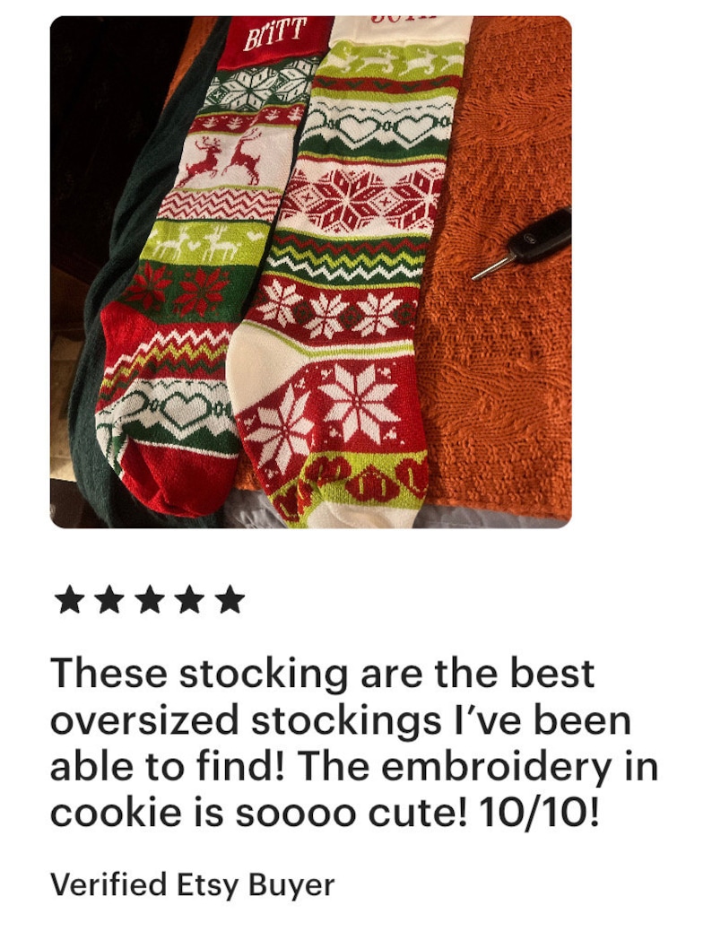 May include: Two red and green Christmas stockings with white snowflakes and reindeer designs. The stockings are personalized with the names "Bitt" and "Sott".