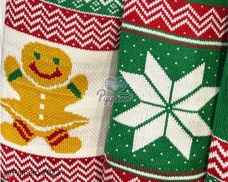 May include: A white knitted fabric with a red and green pattern. The pattern includes a gingerbread man and a snowflake. The gingerbread man is yellow with red and green accents. The snowflake is white with a green background.