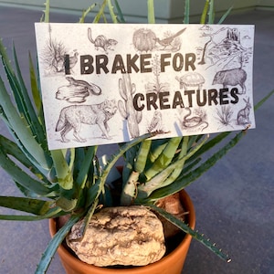 I Brake for Creatures bumper sticker - Southwest themed
