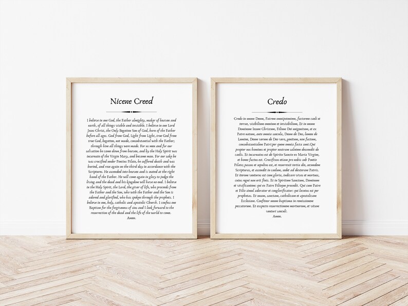 May include: Two framed prints with black text on white paper. The print on the left is titled "Nicene Creed" and the print on the right is titled "Credo". Both prints contain religious text.