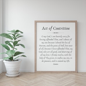 Puede incluir: Una impresi&oacute;n enmarcada con texto en blanco y negro sobre un fondo blanco. El texto dice "Acto de Contrici&oacute;n" e incluye una oraci&oacute;n de arrepentimiento. El marco es de madera marr&oacute;n claro.