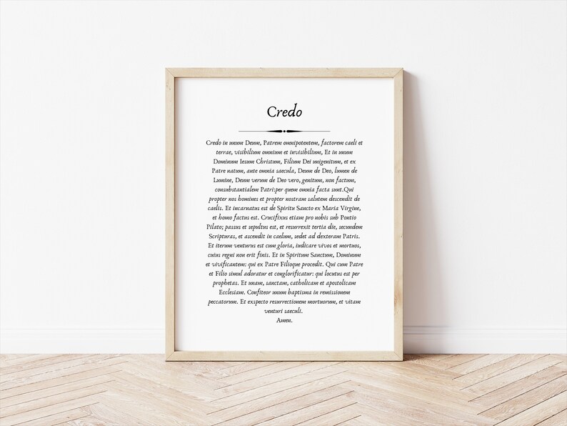 May include: A framed print with the word "Credo" in a large font at the top. The text below is in a smaller font and is a religious text in Latin.