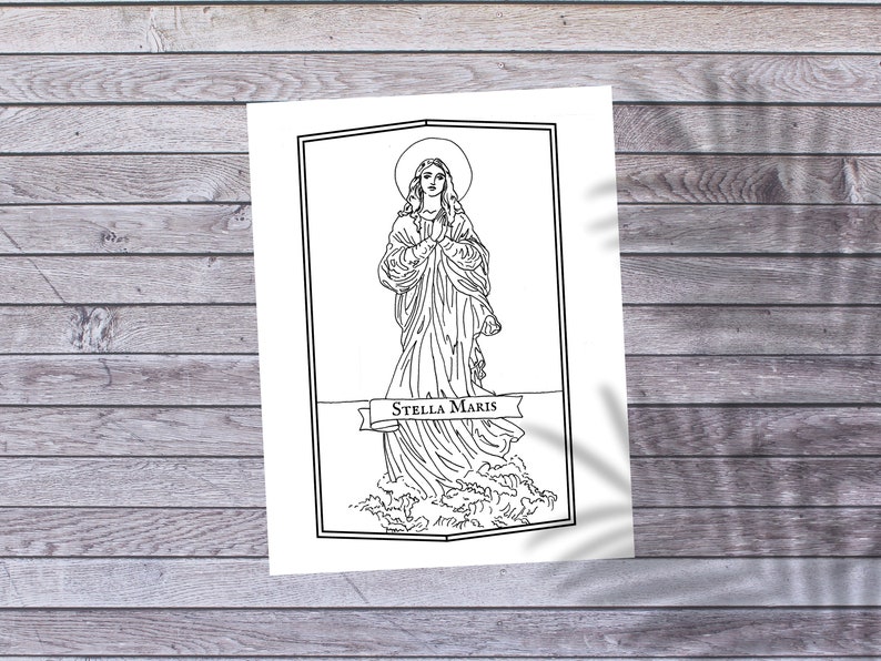 May include: A black and white line drawing of a woman standing on a wave with the text "Stella Maris" above her. The woman is wearing a long robe and has her hands clasped in prayer.