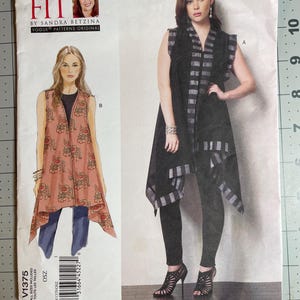 May include: A sewing pattern titled "Today's Fit" by Sandra Betzina. The pattern features illustrations of two women wearing different sleeveless garments. The pattern number is V1375, and it includes all sizes. The cover is white with a grid background.