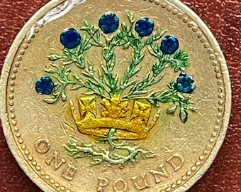 Hand enamelled 1991 British one pound coin flax flowers