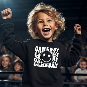 試合の日、スマイリーフェイスシャツ、幼児用スウェットシャツ、ハッピーフェイススウェットシャツ、レトロスウェットシャツ、フットボールスウェットシャツ、スポーツスウェットシャツ