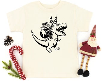 Kinder Dinosaurier Weihnachten T-Shirt, Kleinkind Dinosaurier Shirt, Santa Shirt für Kinder, Urlaub Tshirt, Kinder Dinosaurier Shirt, Weihnachtsgrafik T-Shirt