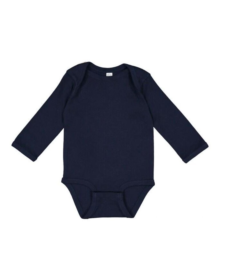 May include: A navy blue long-sleeved baby bodysuit.