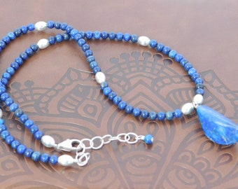 Lapis Love is Created with a Lapis Lazuli Focal Bead, Silver Plated Rice Beads and 4MM Lapis Lazuli Round Beads, SS Lobster Clasp and  Chain