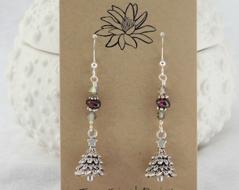 Tannenbaum are Created with High Quality Crystals, SS Bali Daisy, Garnet Beads with Christmas Tree Pewter Charms on SS French Ear Wires