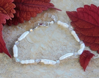 Knotted Pearls is Created with Fresh Water Baroque Pearls and Clear Crystals Hand Knotted, Grey Silk Thread with SS Lobster Clasp