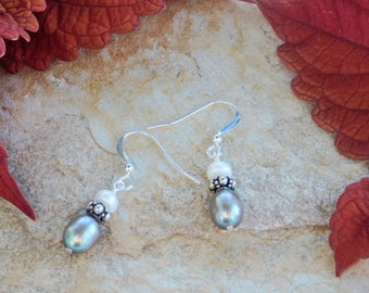 Pearly Drops is Made with Light Green Fresh Water Pearls, SS Bali Beads and White Fresh Water Pearls Hanging on SS French Ear Wires