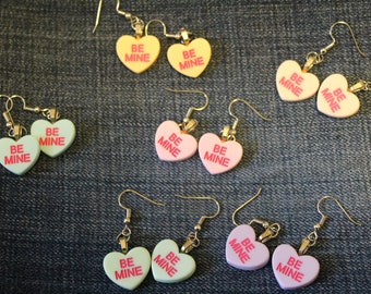 Conversation heart earrings; "Be mine" or "Hug Me"