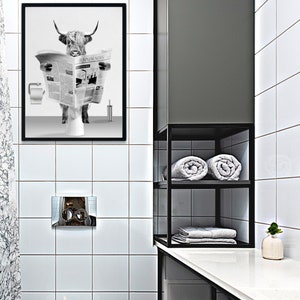 Highland cow reading newspaper toilet artwork
