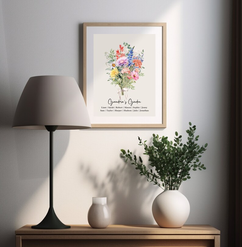 May include: A watercolor print of a bouquet of flowers with a white ribbon and the text "Grandma's Garden" with a list of names below.