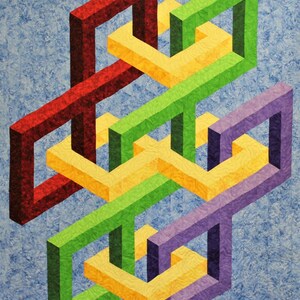 Puede incluir: Una colcha geométrica colorida con cuadrados entrelazados en tonos de rojo, verde, amarillo y morado. Los cuadrados están dispuestos en un patrón tridimensional, creando una ilusión óptica.