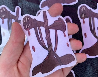 May include: A sticker featuring a cartoon illustration of a brown, toothy creature with a long, thin neck and a body that resembles a tree trunk. The creature is dripping with red liquid, suggesting blood. The sticker is on a white background.