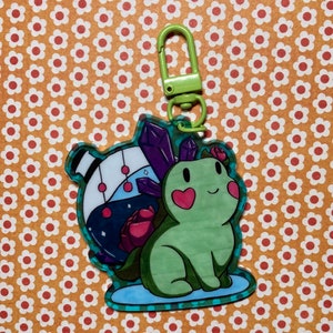 Forg The Frog Adventurer Double Sided Acrylic Charm