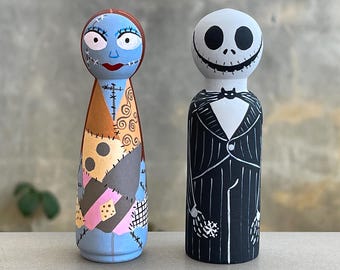 Muñecos de madera de Jack y Sally Peg de Pesadilla antes de Navidad pintados a mano.