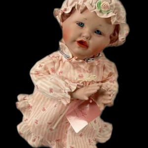 Edwin M. Knowles Co., Ashton-Drake Galleries Porcelain Doll—“Emily “