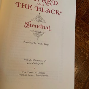 May include: The Red and the Black by Stendhal, translated by Charles Tergie. The book cover features a decorative title in red lettering with a grey and white floral design.