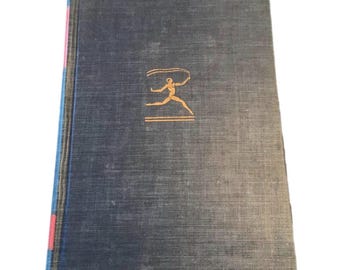 May include: A vintage book with a dark blue cover and a gold illustration of a person jumping rope. The spine has a red accent. The book's cover has a textured appearance.
