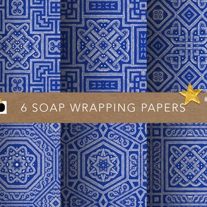 May include: Six blue and white patterned soap wrapping papers with a geometric design. The papers are labeled "6 SOAP WRAPPING PAPERS" and "#0129".
