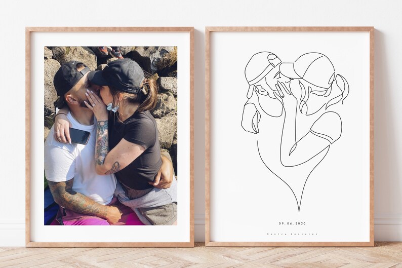 May include: Two framed prints. The left print is a color photograph of a couple kissing, wearing black baseball caps. The right print is a black line drawing of a couple kissing, with the date 09.06.2020 and a name below.